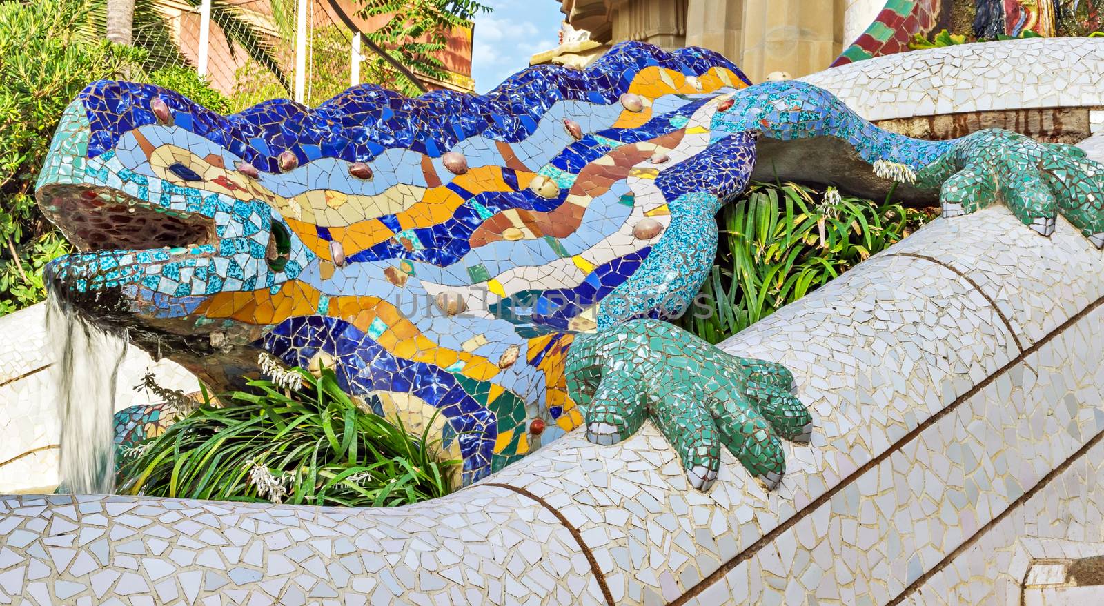 mosaic ceramic dragon, salamandra, lizard fountain - symbol of luck and happiness in Parc Guell, designed by Antonio Gaudi Barcelona, Spain
