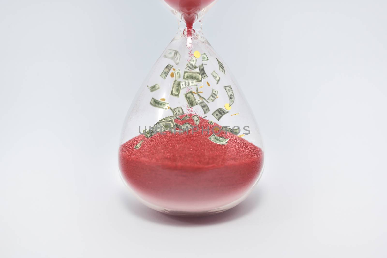Hourglasses and coin isolated on white background. Time as money concept. money inside sandclock