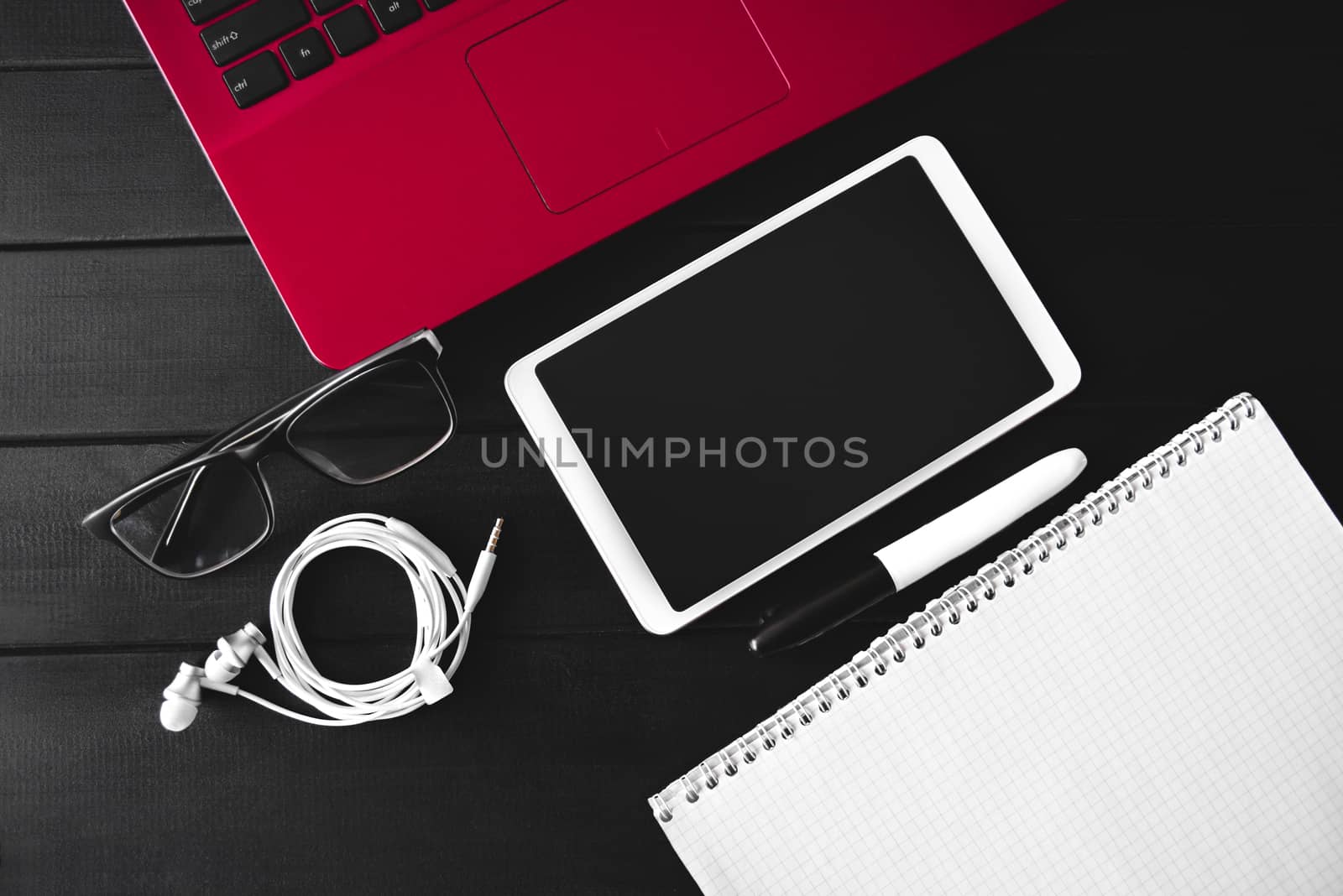 Home work concept, Tablet Pc, notepad and Laptop on wooden background, planning personal income. preparation to work. free copyspace