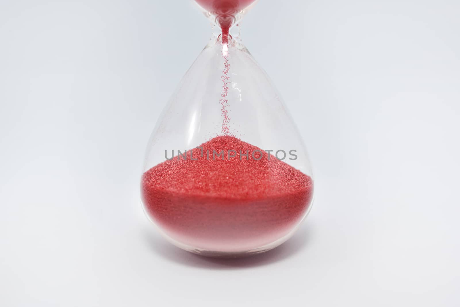 Hourglass clock isolated on white background