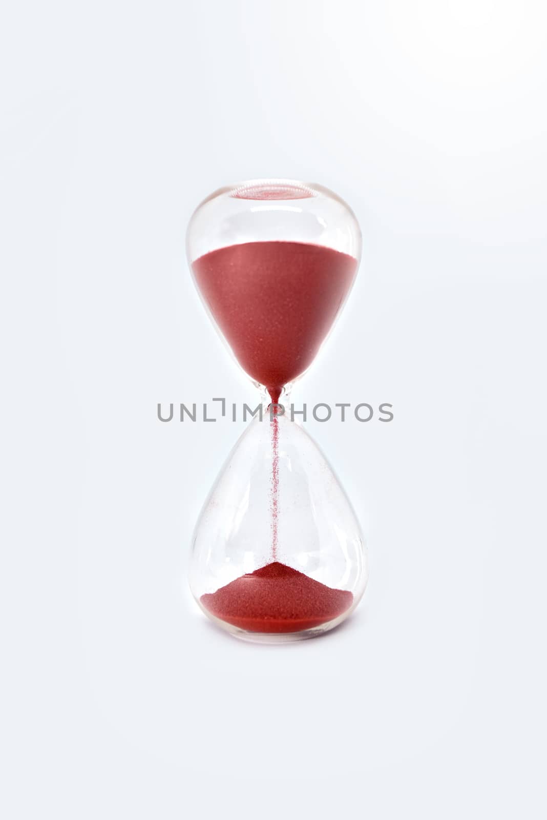 Hourglass clock isolated on white background