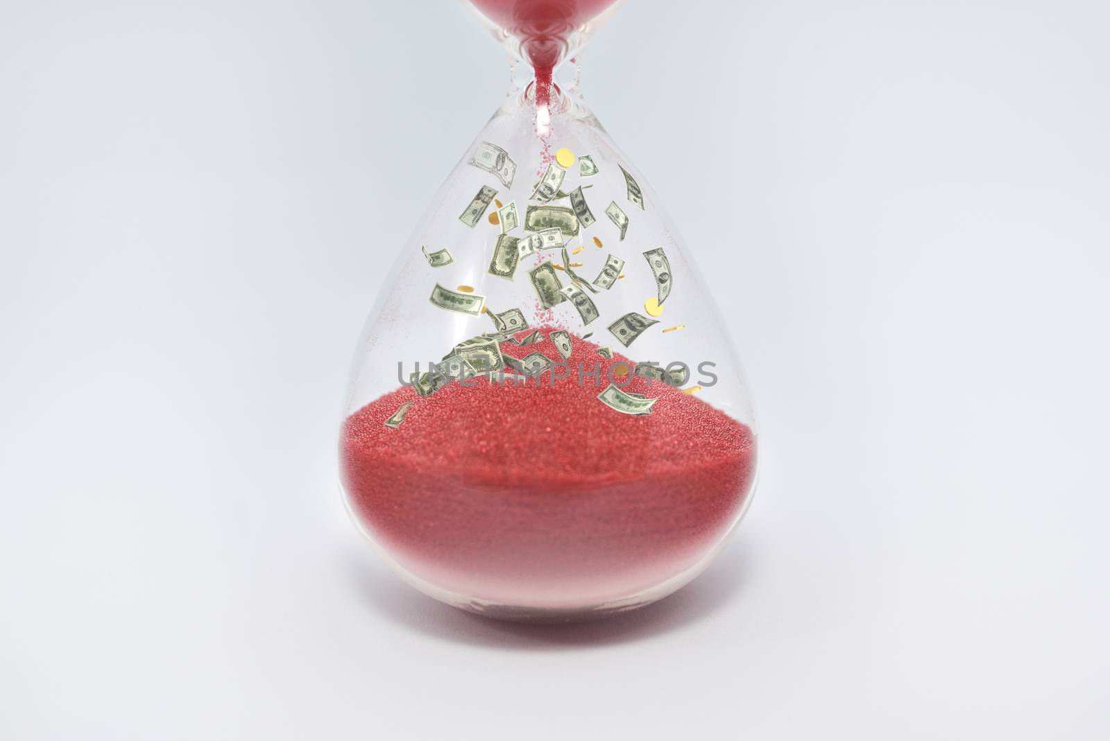 Hourglasses and coin isolated on white background. Time as money concept. money inside sandclock