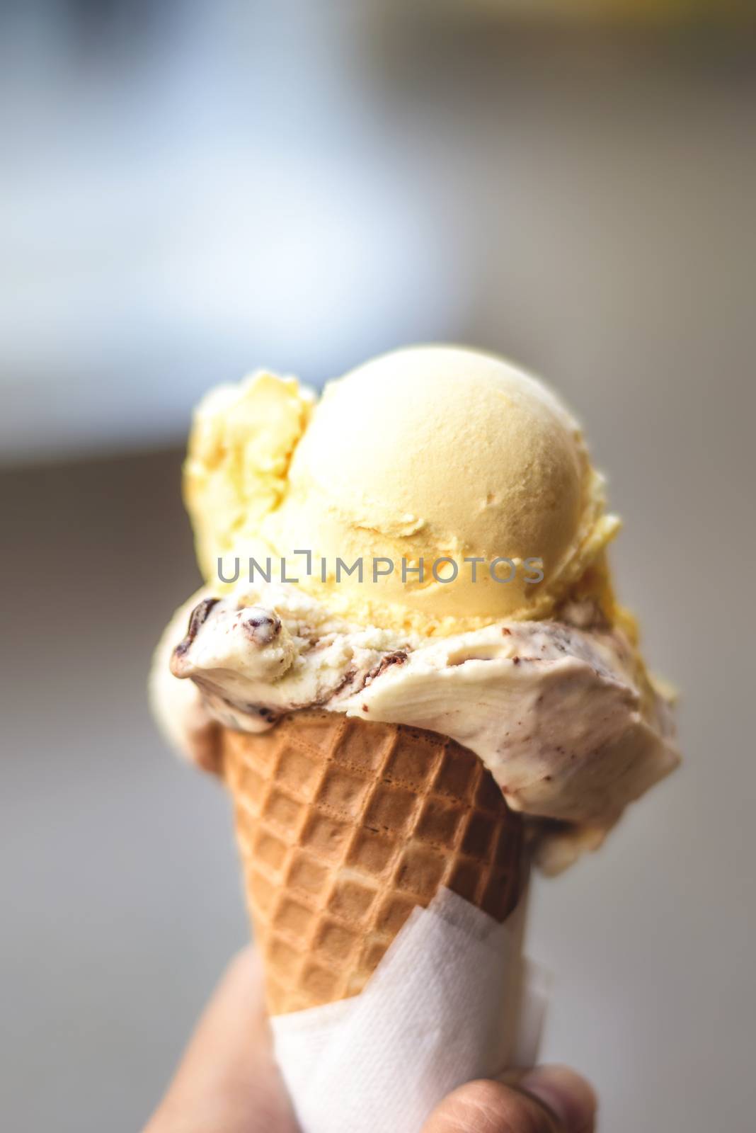 Tasty ice cream in hand, close-up, nice view, Bokeh