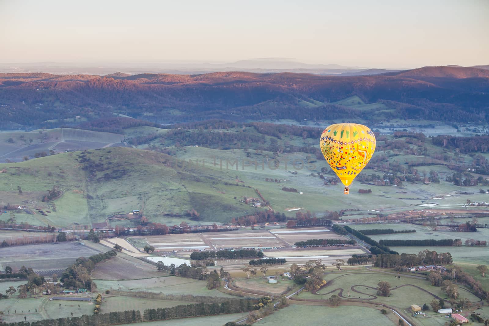 Hot Air Balloon At Sunrise in Australia by FiledIMAGE