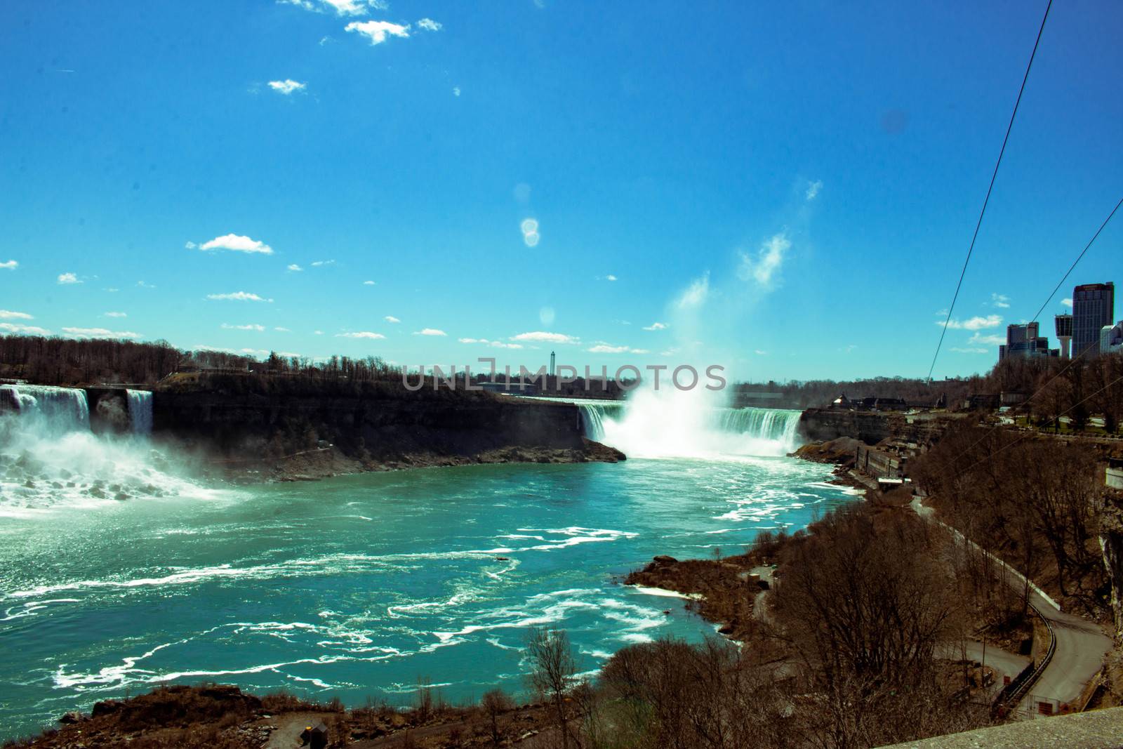 View of Niagara waterfalls during sunrise from Canada side by mynewturtle1