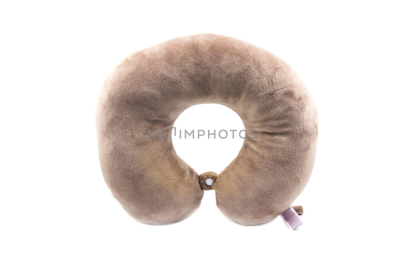 Brown neck pillows for travelling isolated on white background.