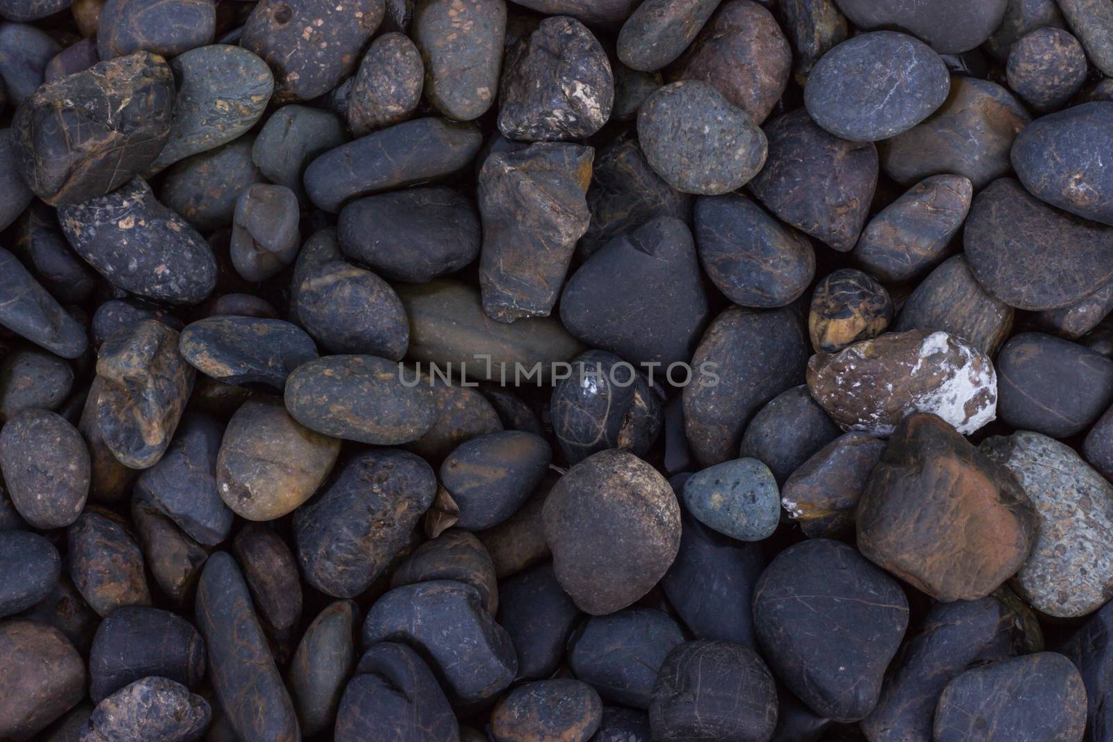 River stone for decoration in the garden and home. Texture background