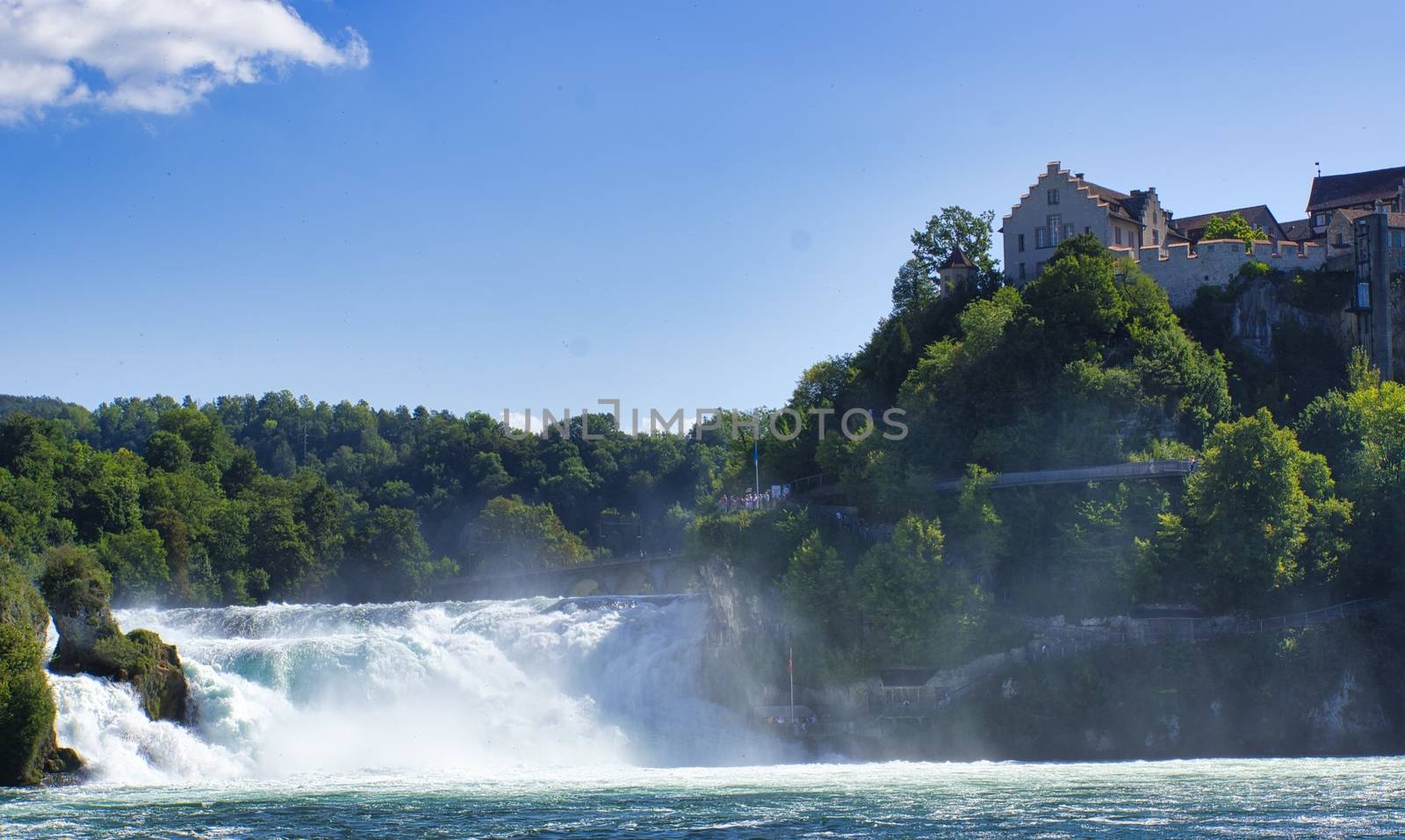 the famous rhine falls in the swiss near the city of Schaffhausen - sunny day and blue sky