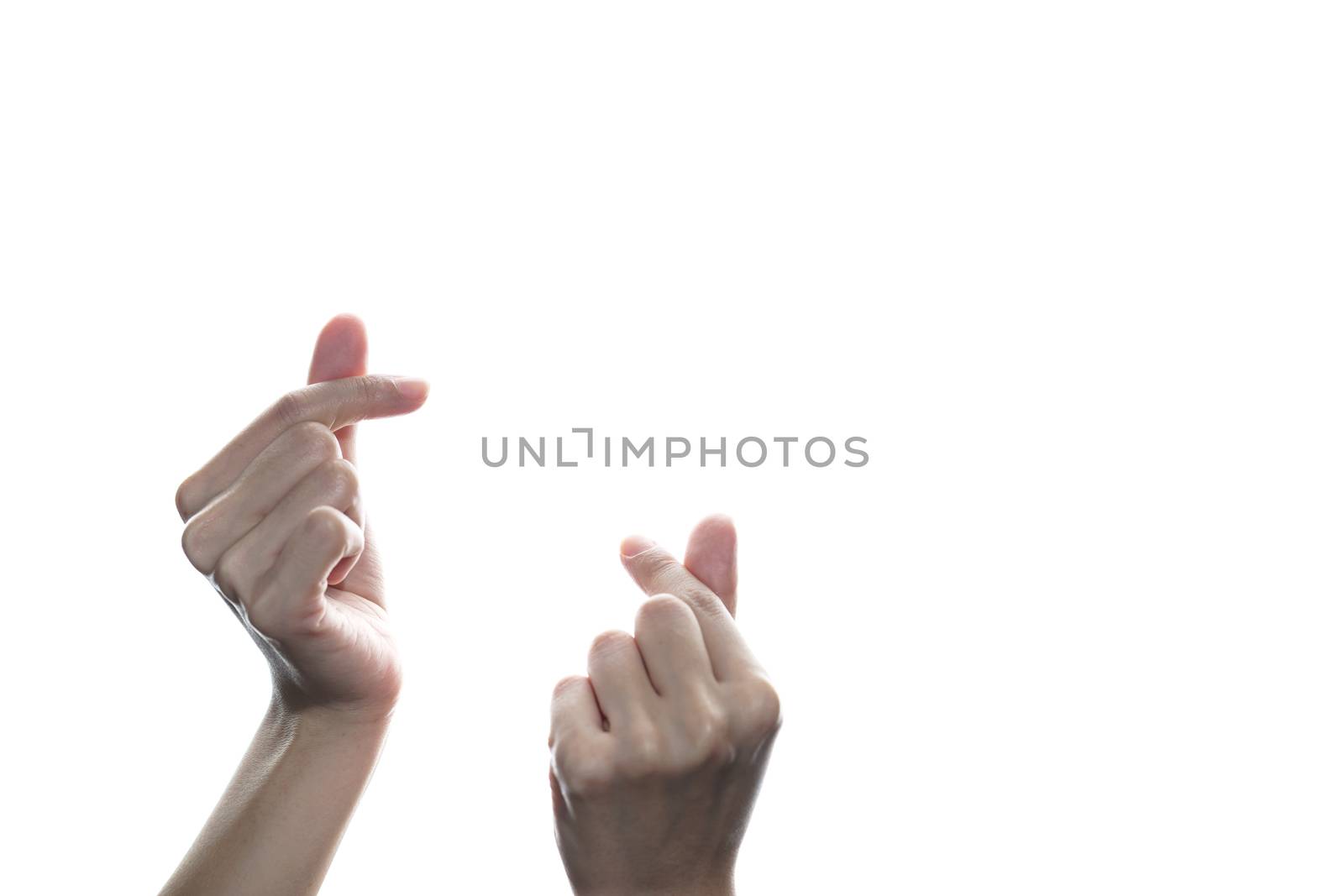 Mini heart hand isolated on white background. Sign for the love world.