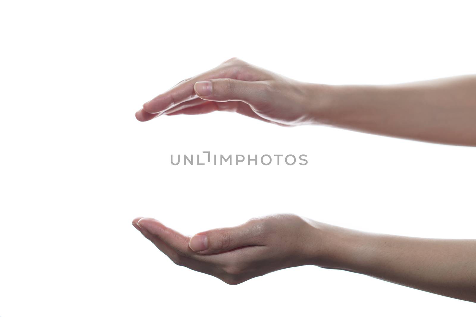 Female open cupped hands with empty between on white isolated background.