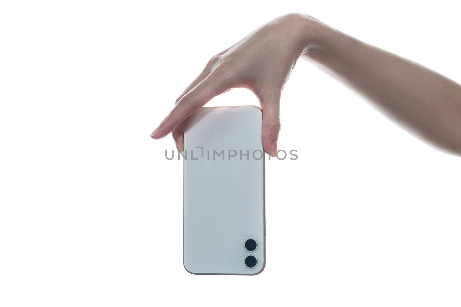 Woman hand holding phone isolated on a white background. back view, up side down.