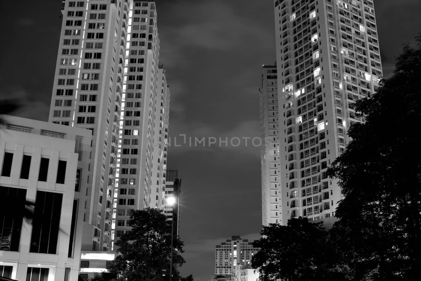 residential buildings twins at night view gray color tone by cgdeaw