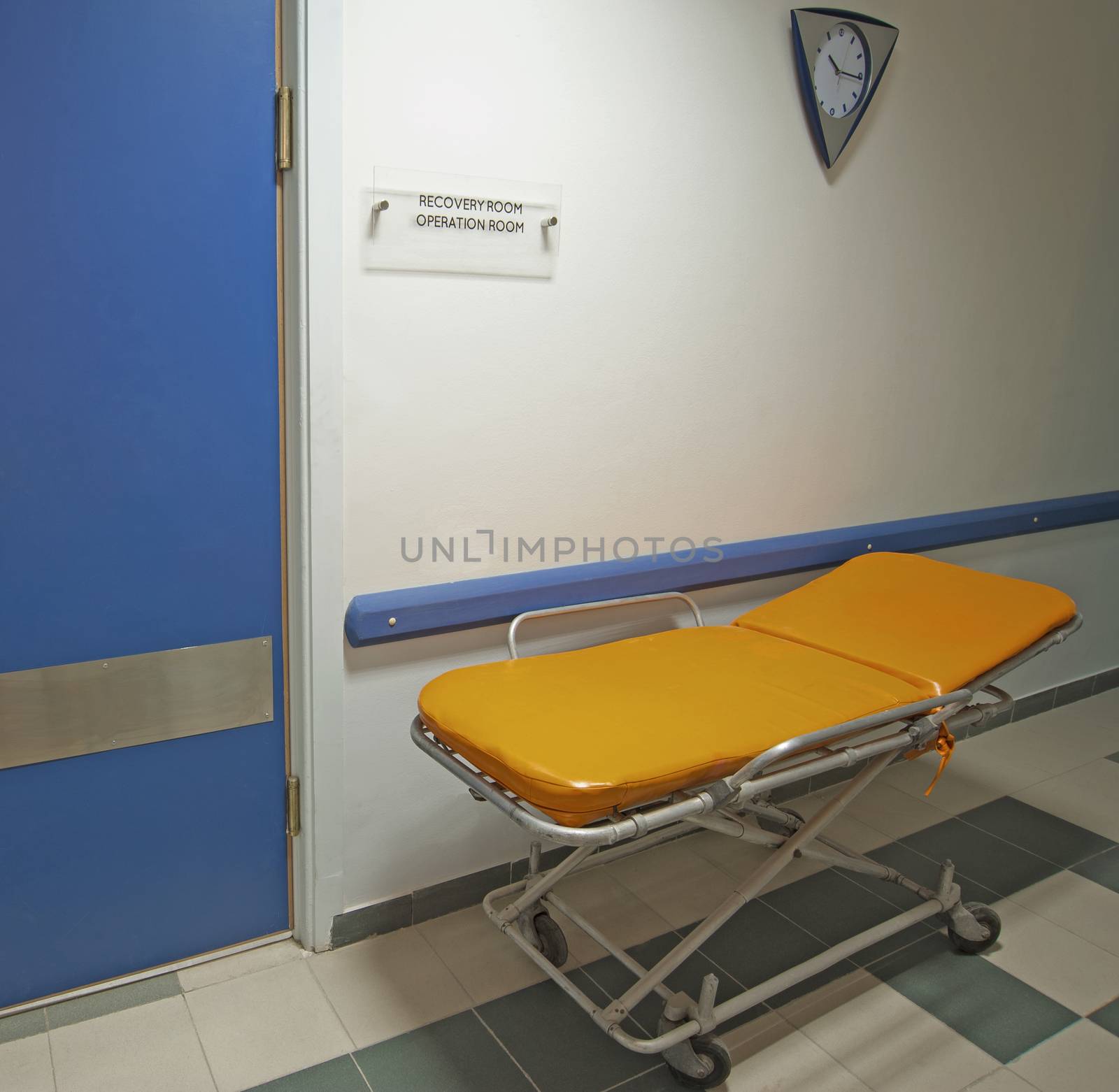 Medical trolley outside an operating room by paulvinten