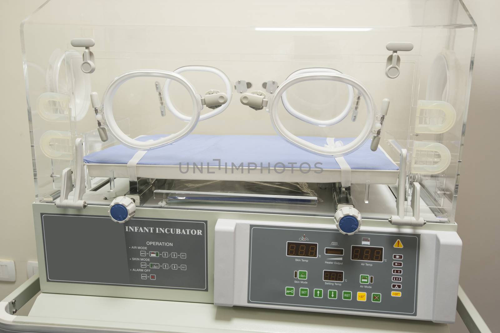 Closeup of infant incubator technology in a medical center hospital