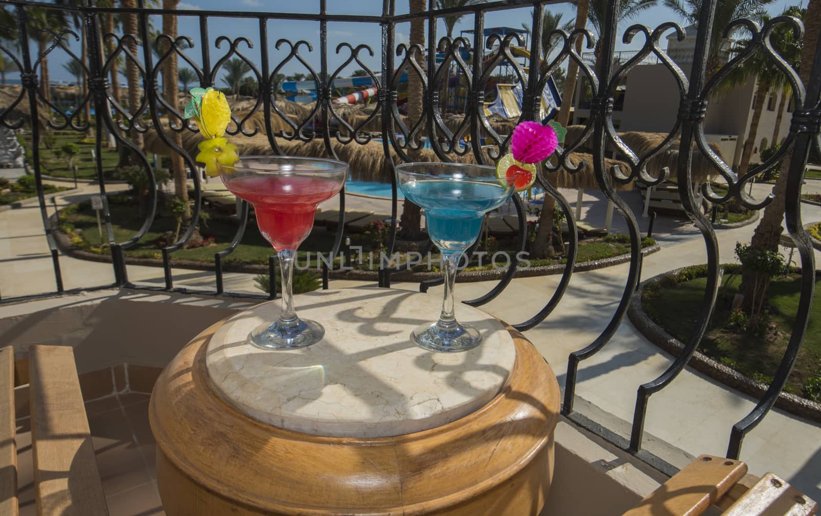 Cocktail drinks on balcony of a luxury hotel room by paulvinten