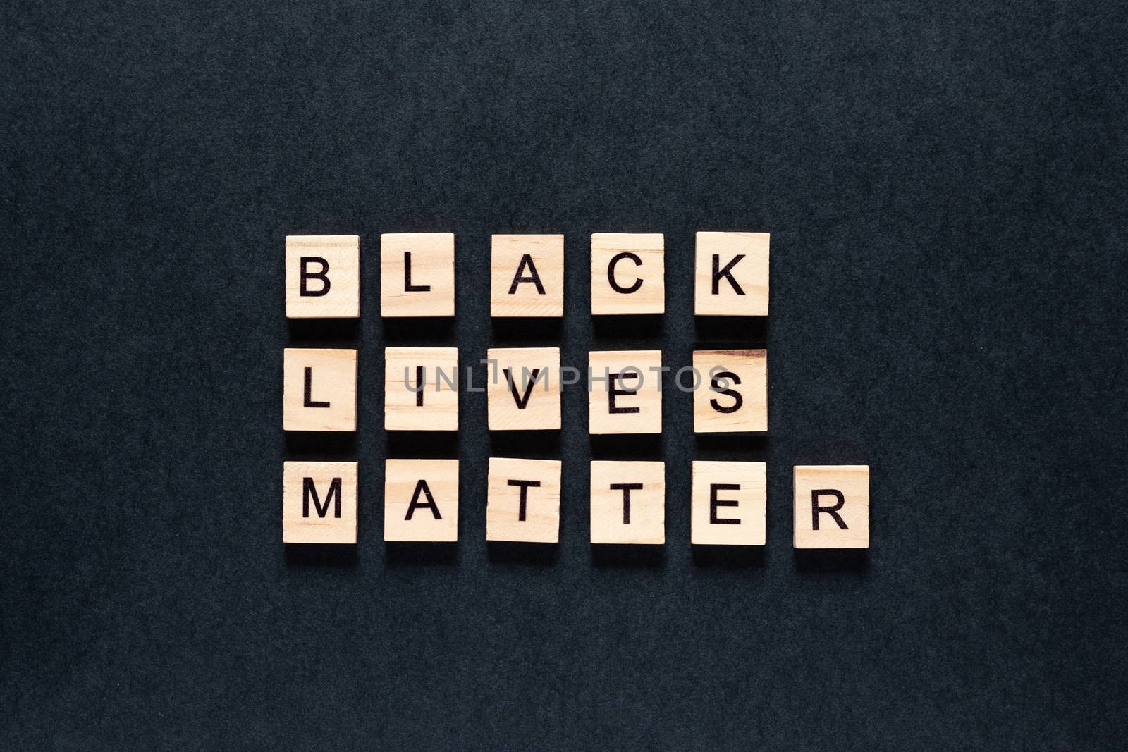 Black lives matter inscription on a black background. protests. unrest. hashtag Blacklivesmatter by Pirlik
