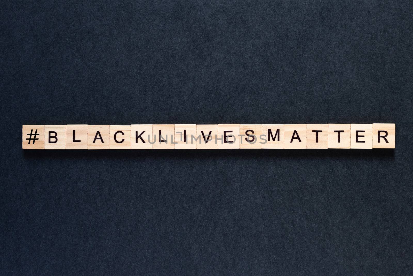 Black lives matter inscription on a black background. protests. unrest. hashtag Blacklivesmatter by Pirlik