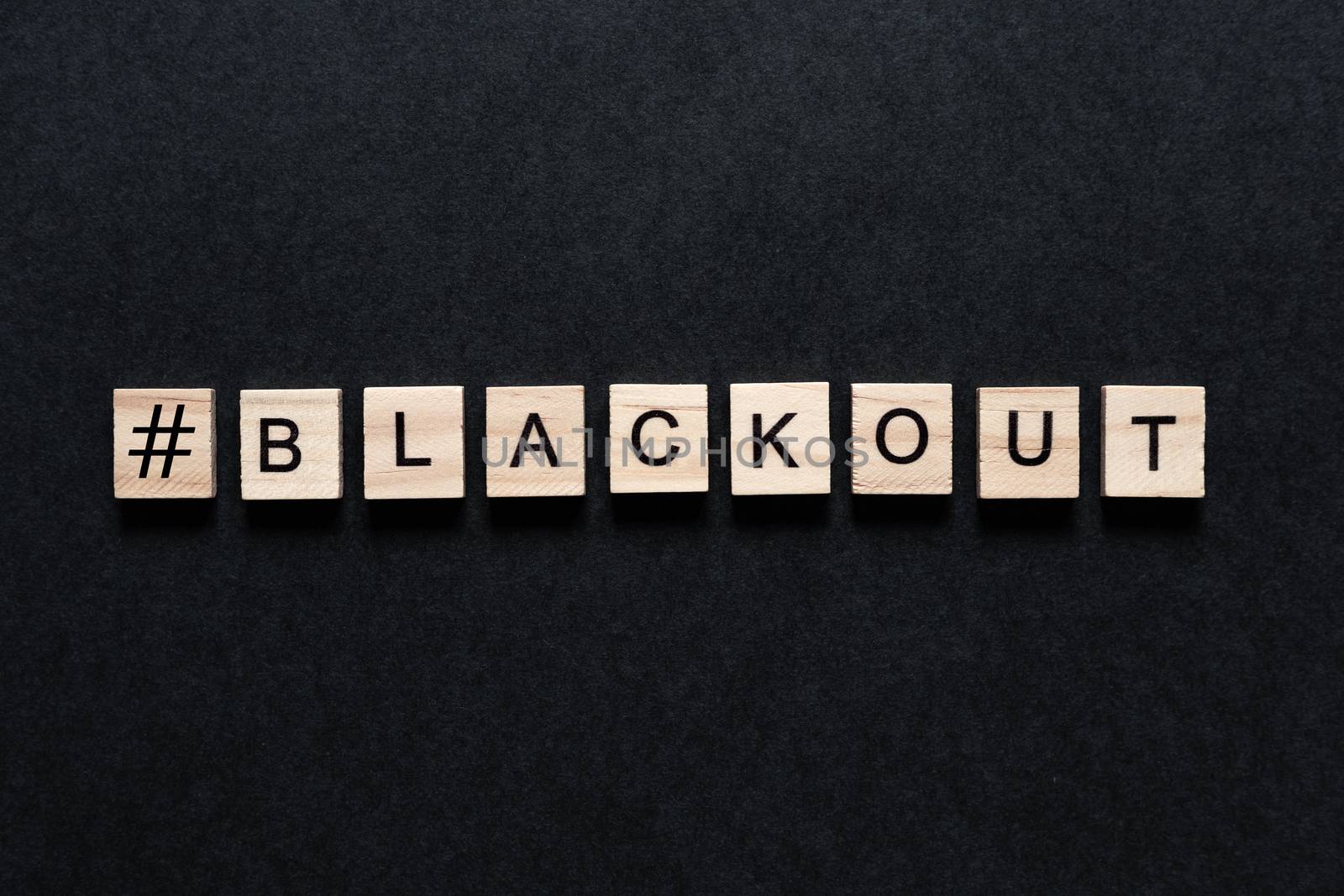 Blackout inscription on a black background. Black lives matter, blackout tuesday 2020 concept. blackout in USA. unrest. protests. by Pirlik