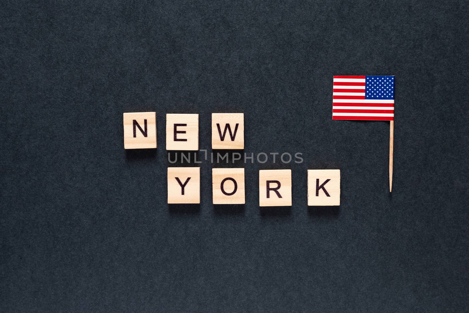 new york inscription on a black background with the American flag. Blackout tuesday. Black lives matter, blackout tuesday 2020 concept. unrest. rallies. brigandage. marauders. looting. USA