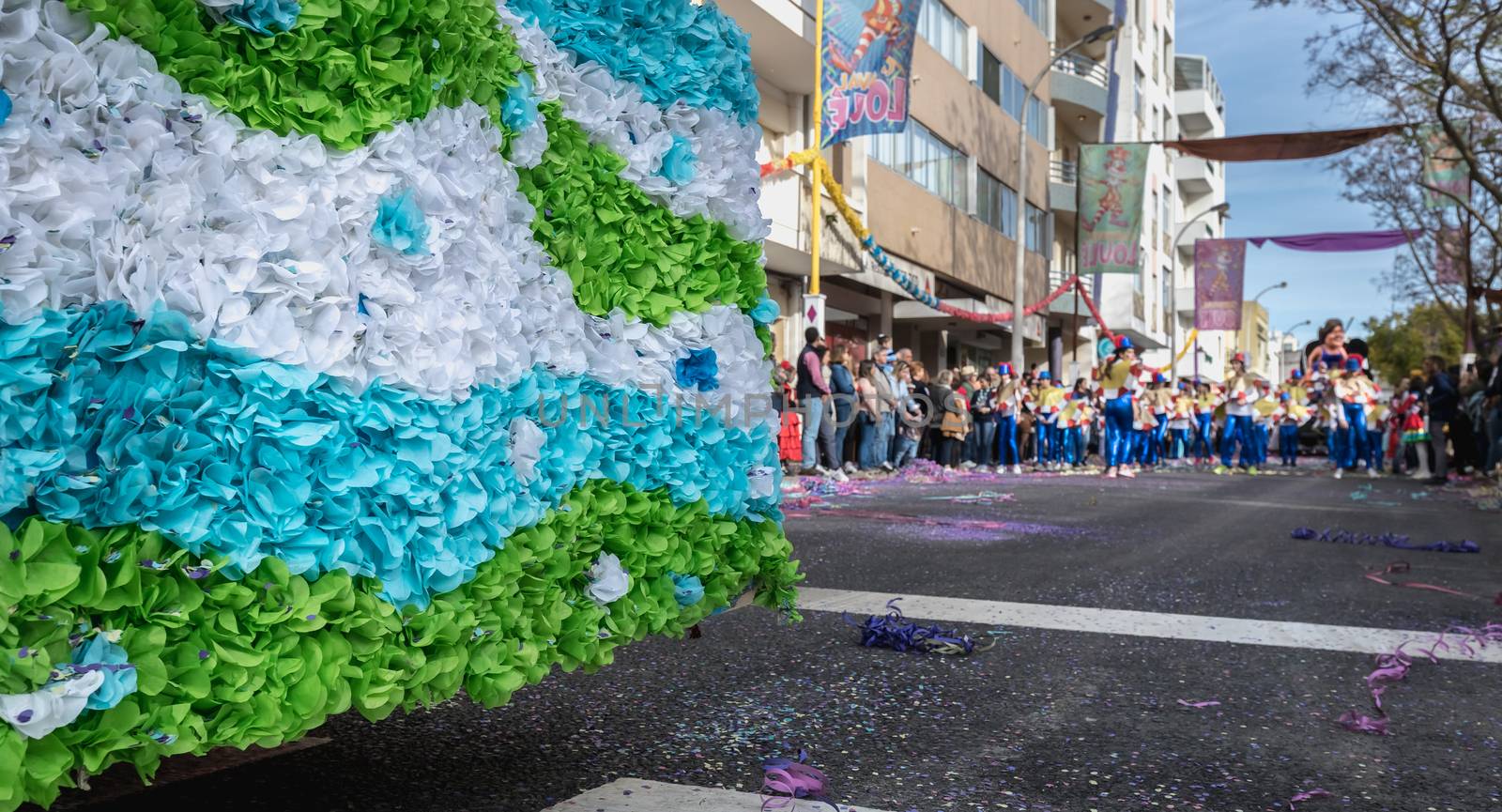 Loule, Portugal - February 25, 2020: dancers parading in the street in front of the public in the parade of the traditional carnival of Loule city on a February day