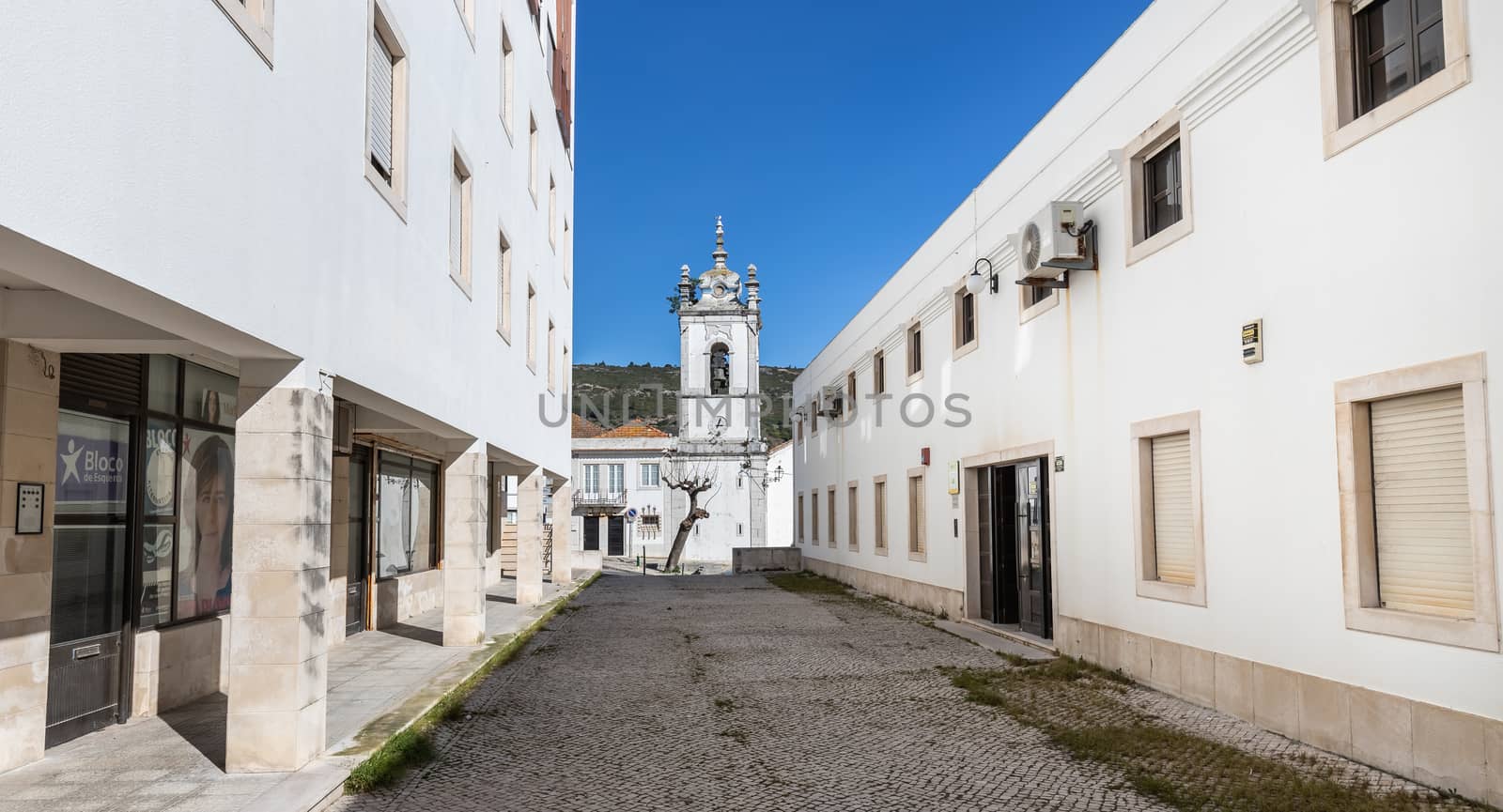 Sesimbra, Portugal - February 19, 2020: Architecture detail of the conservation of civil registers (Conservatoria do Registro Civil) next to the Matriz church of Sesimbra on a winter day