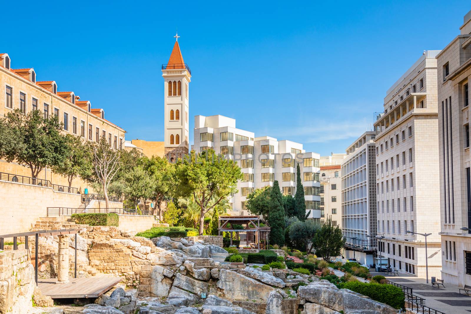 Roman baths ancient ruins site, modern buidings and Saint Louis Cathedral of the Capuchin Fathers Latin Catholic church in the downtown of Beirut, Lebanon
