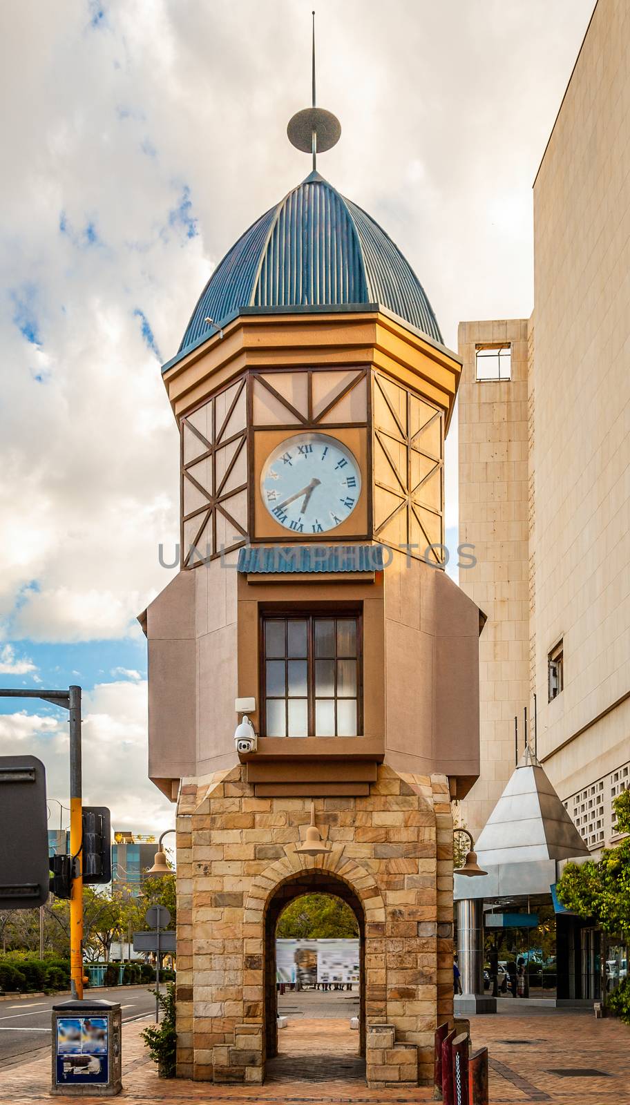 Clock tower on the street in city center of  Windhoek, Namibia by ambeon
