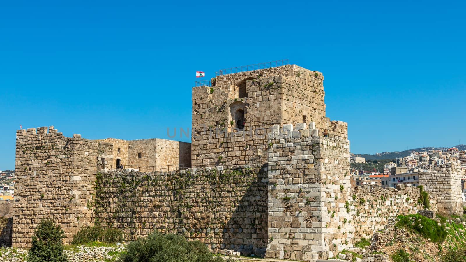 Gibelet old crusader castle walls and towers in Byblos, Lebanon by ambeon