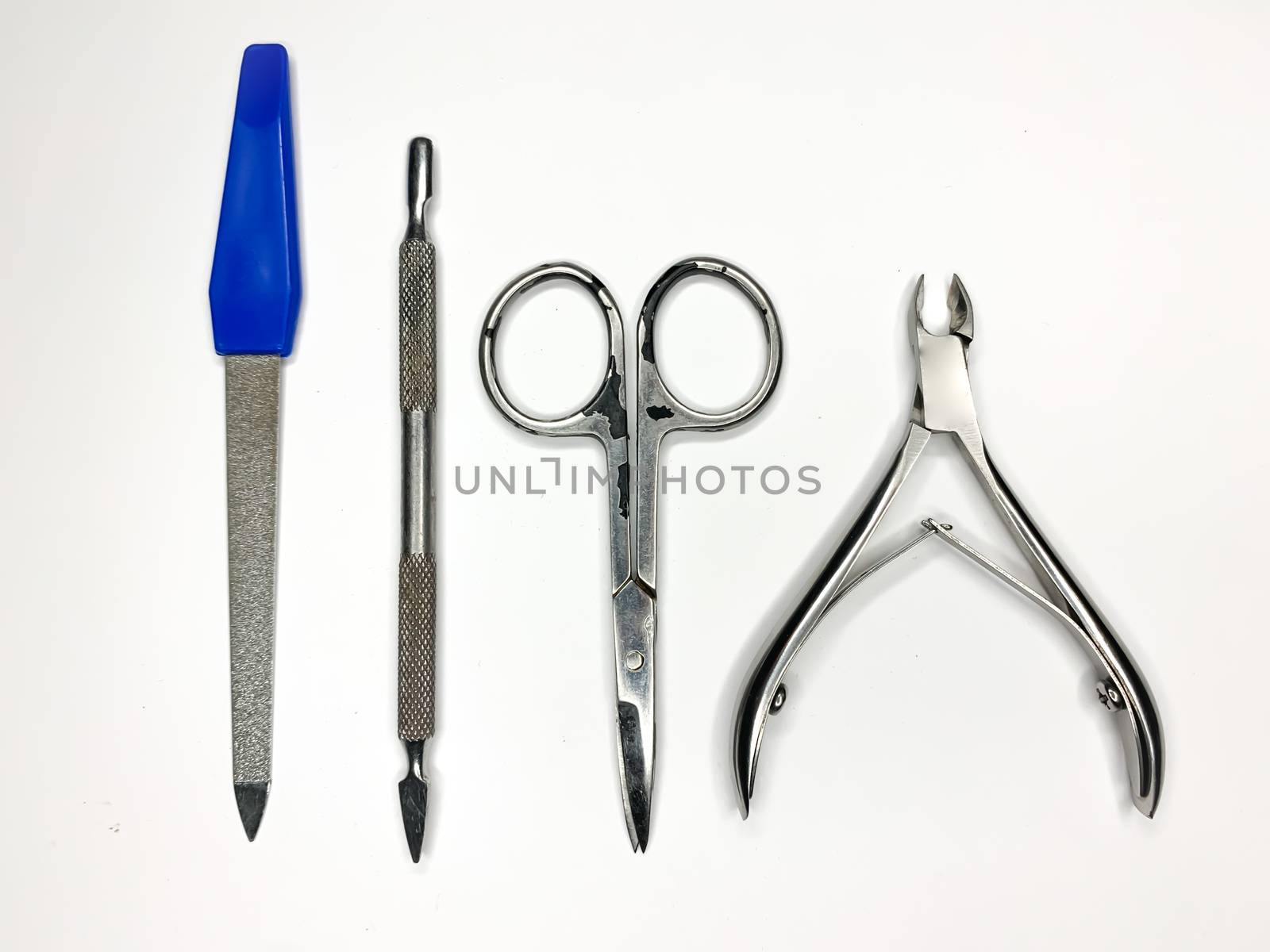 Manicure pedicure tools set nail care top view on a white background
