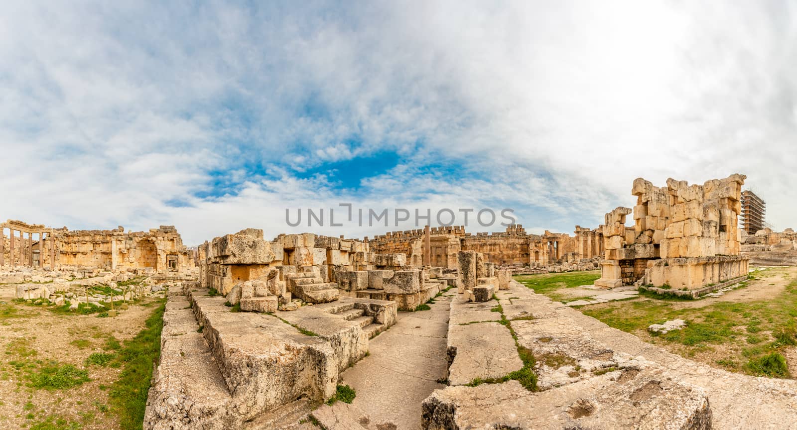 Ancient ruined walls and columns of Grand Court of Jupiter templ by ambeon