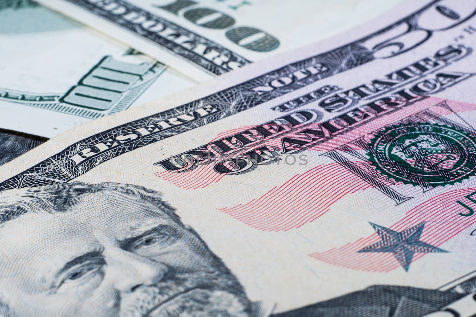Close-up photo of money. A bunch of dollar bills. U.S. dollars.