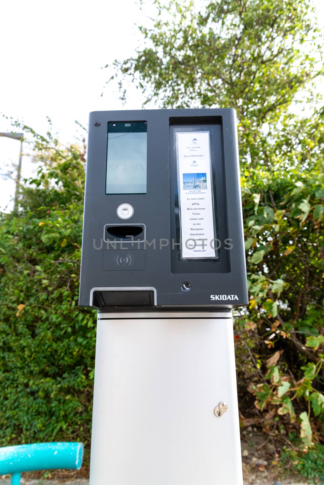 Fehmarn, Schleswig-Holstein/Germany - 05.09.2019: A ticket machine with display for a barrier system from a private parking lot of a hotel, where you pay at the reception