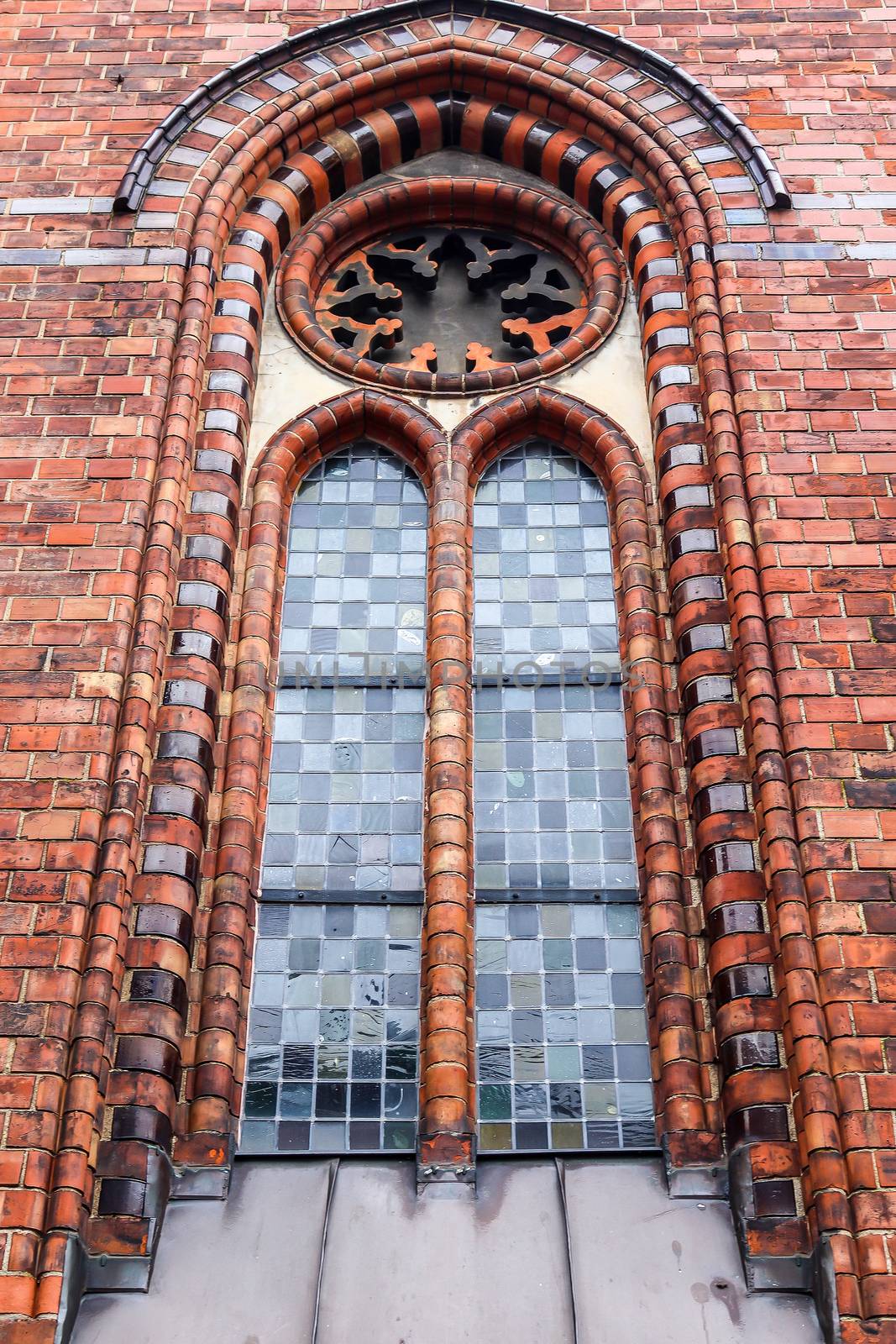 Old weathered and aged religious church building walls and windows found all over Europe