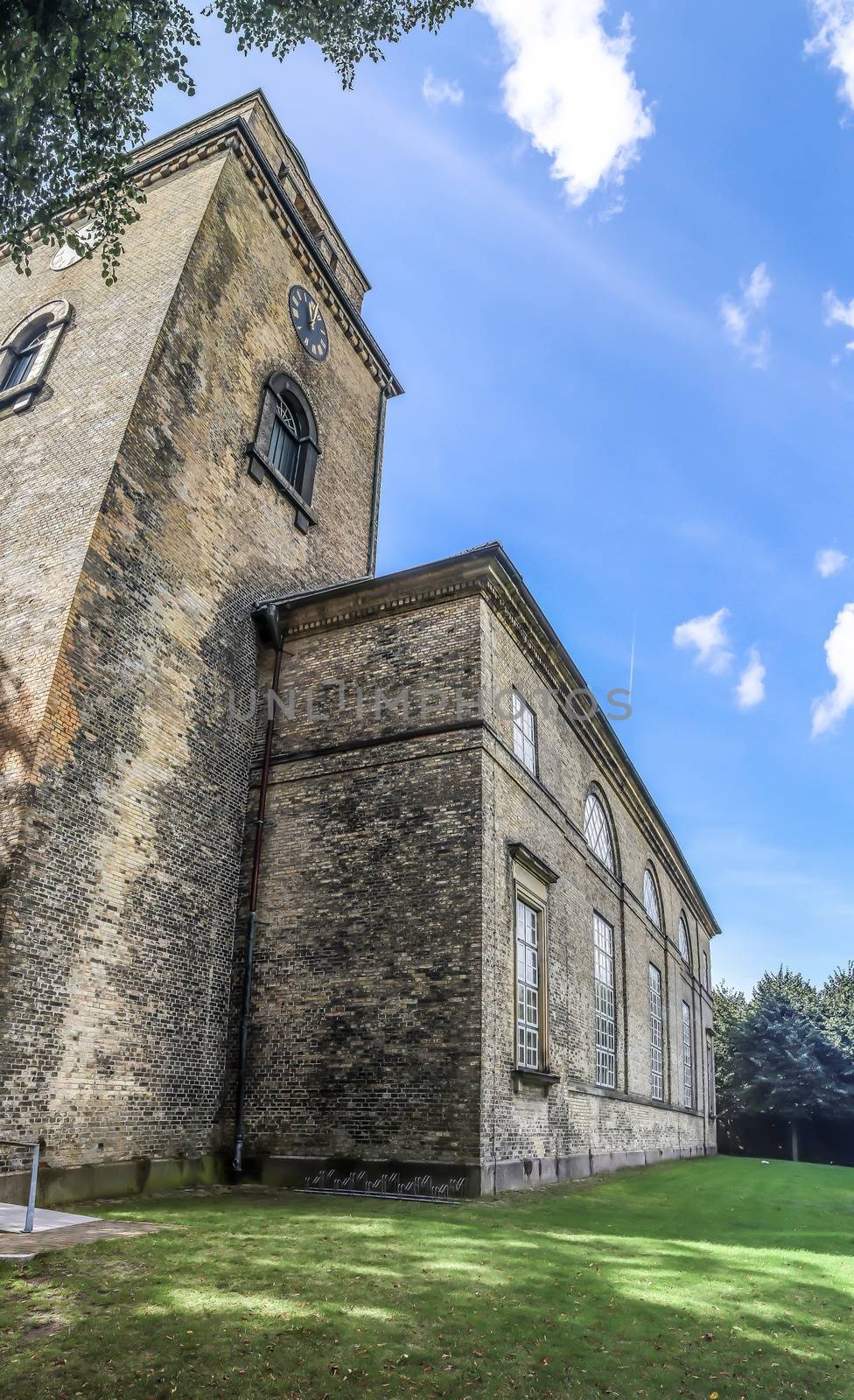 Old weathered and aged religious church building walls and windows found all over Europe