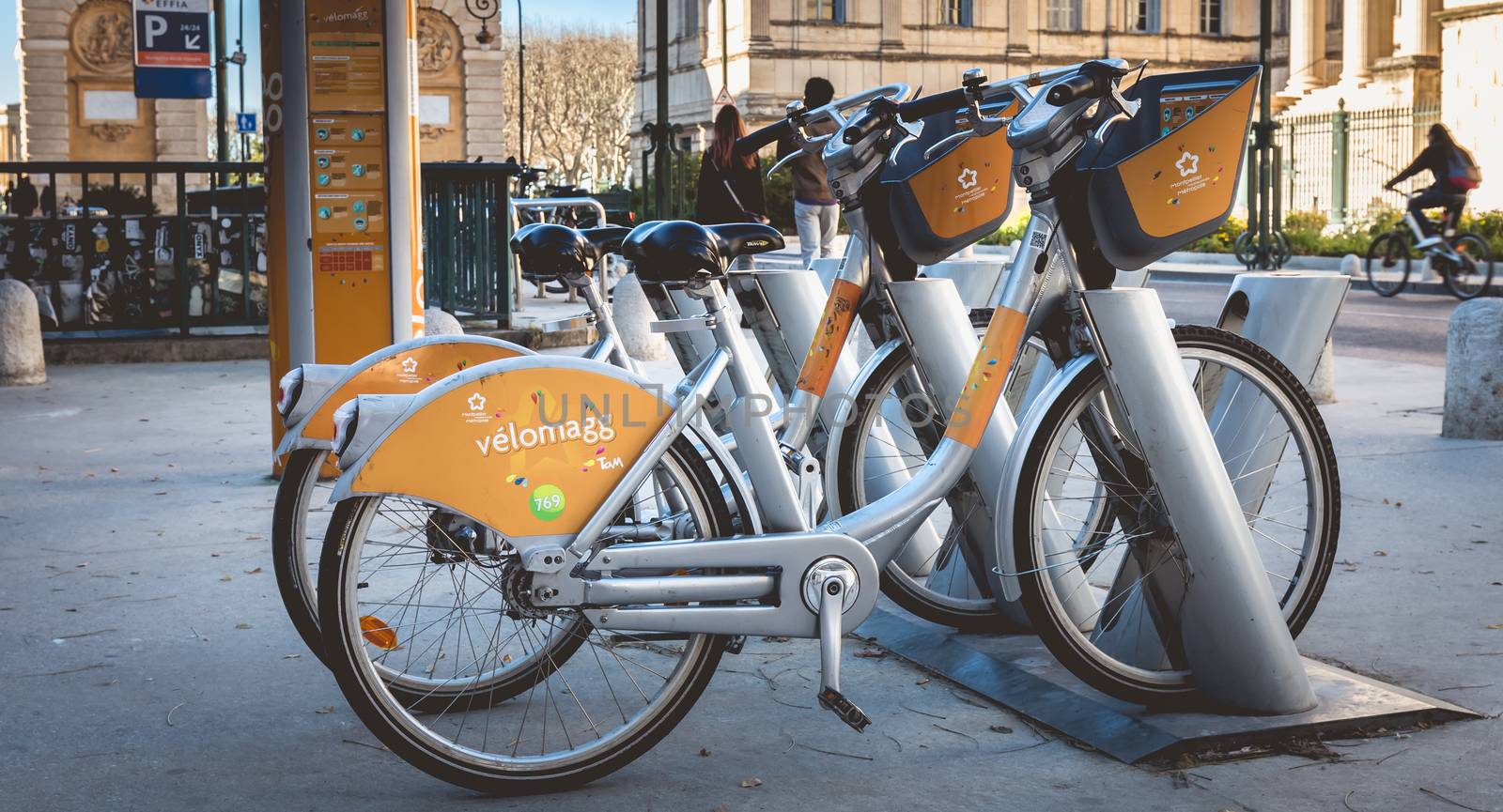 Montpellier, France - January 2, 2019: Velomagg bike sharing city bikes for rental in Montpellier. Bike sharing is a popular city transport