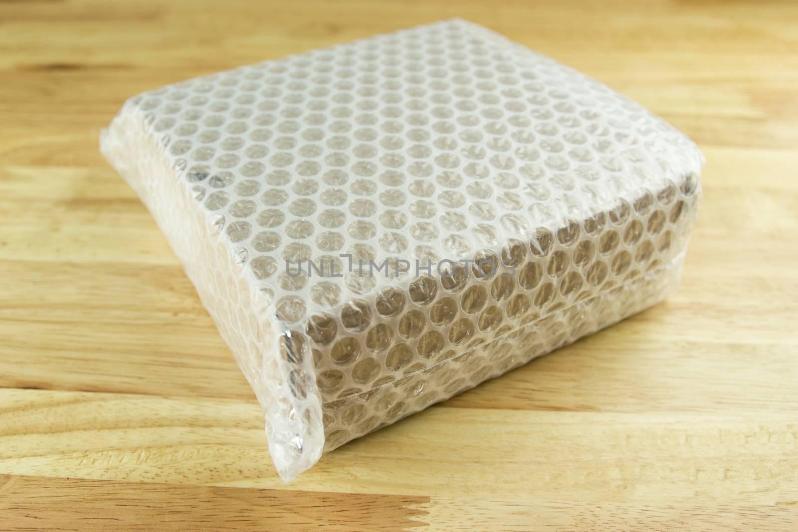 Bubbles covering the box by bubble wrap for protection product cracked  or insurance During transit 