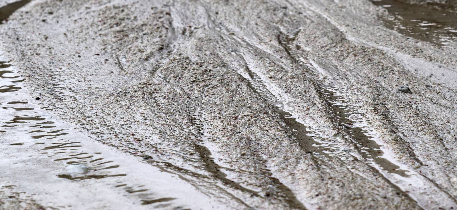 Beautiful shots of the white beach sand on the Seychelles paradise island with footprints.