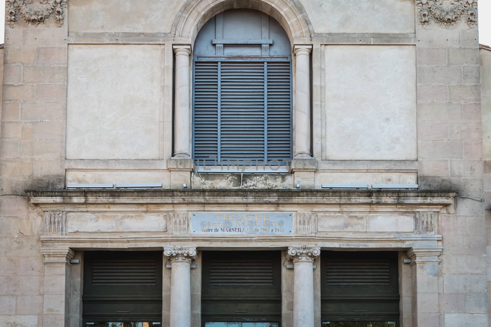 Marseillan, France - December 30, 2018: architectural detail of the Henri Maurin theater in the historic city center on a winter day