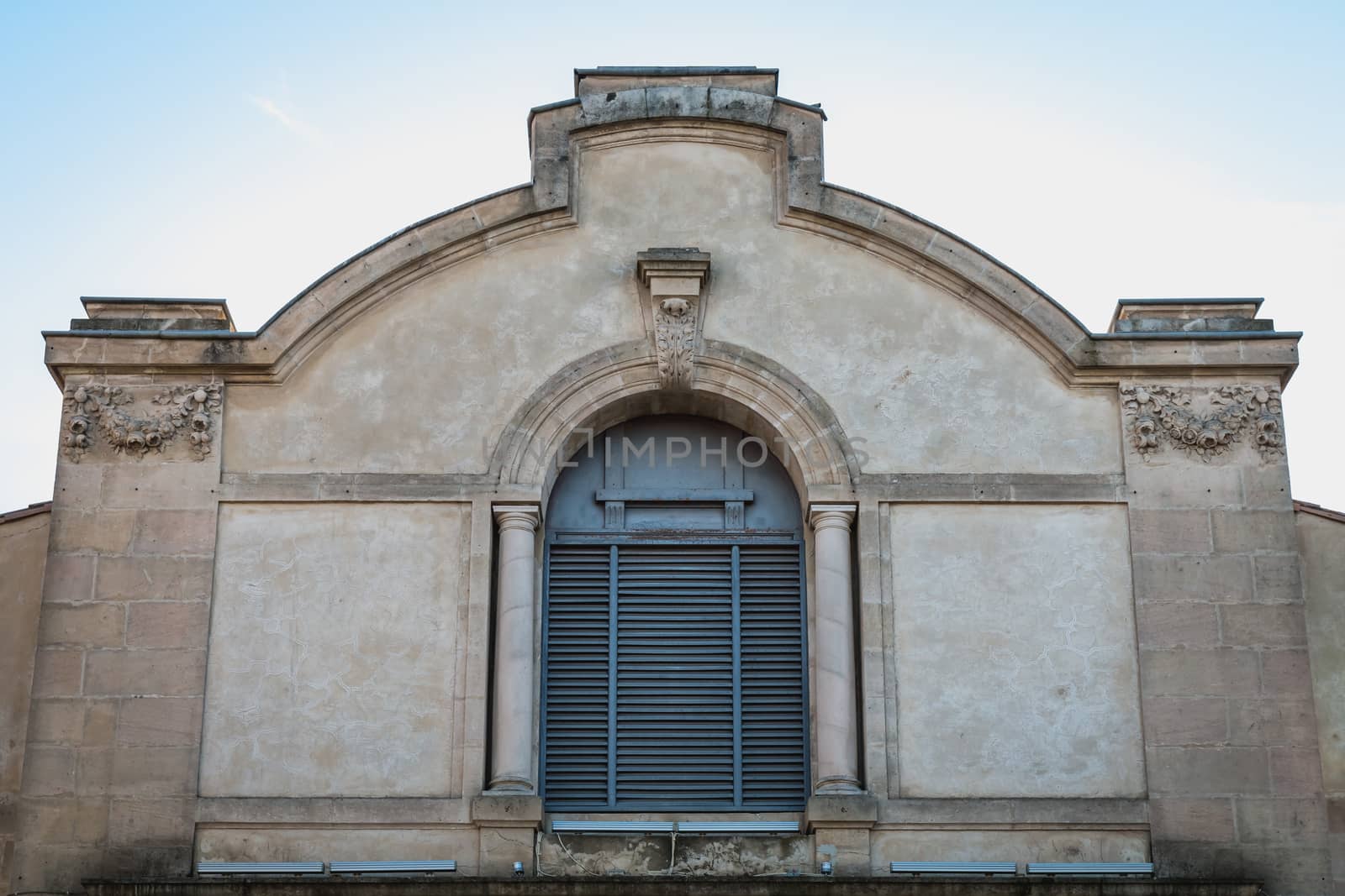 Marseillan, France - December 30, 2018: architectural detail of the Henri Maurin theater in the historic city center on a winter day