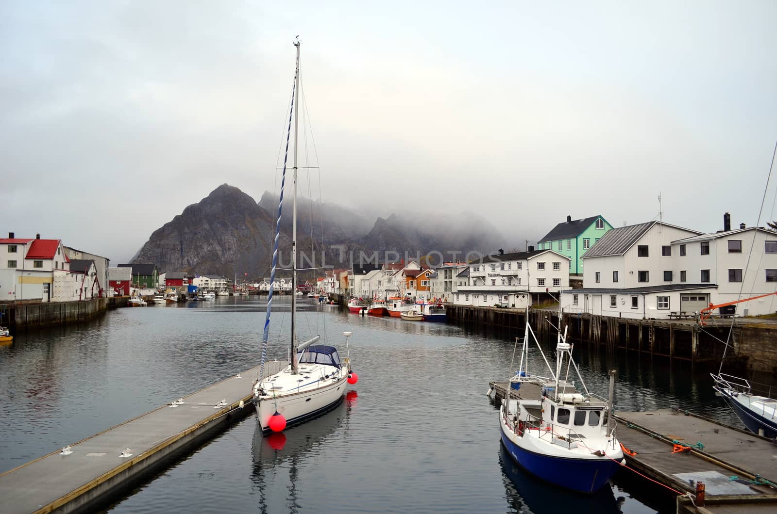 Marvelous small silent harbor in Northern Norway in a cloudy day