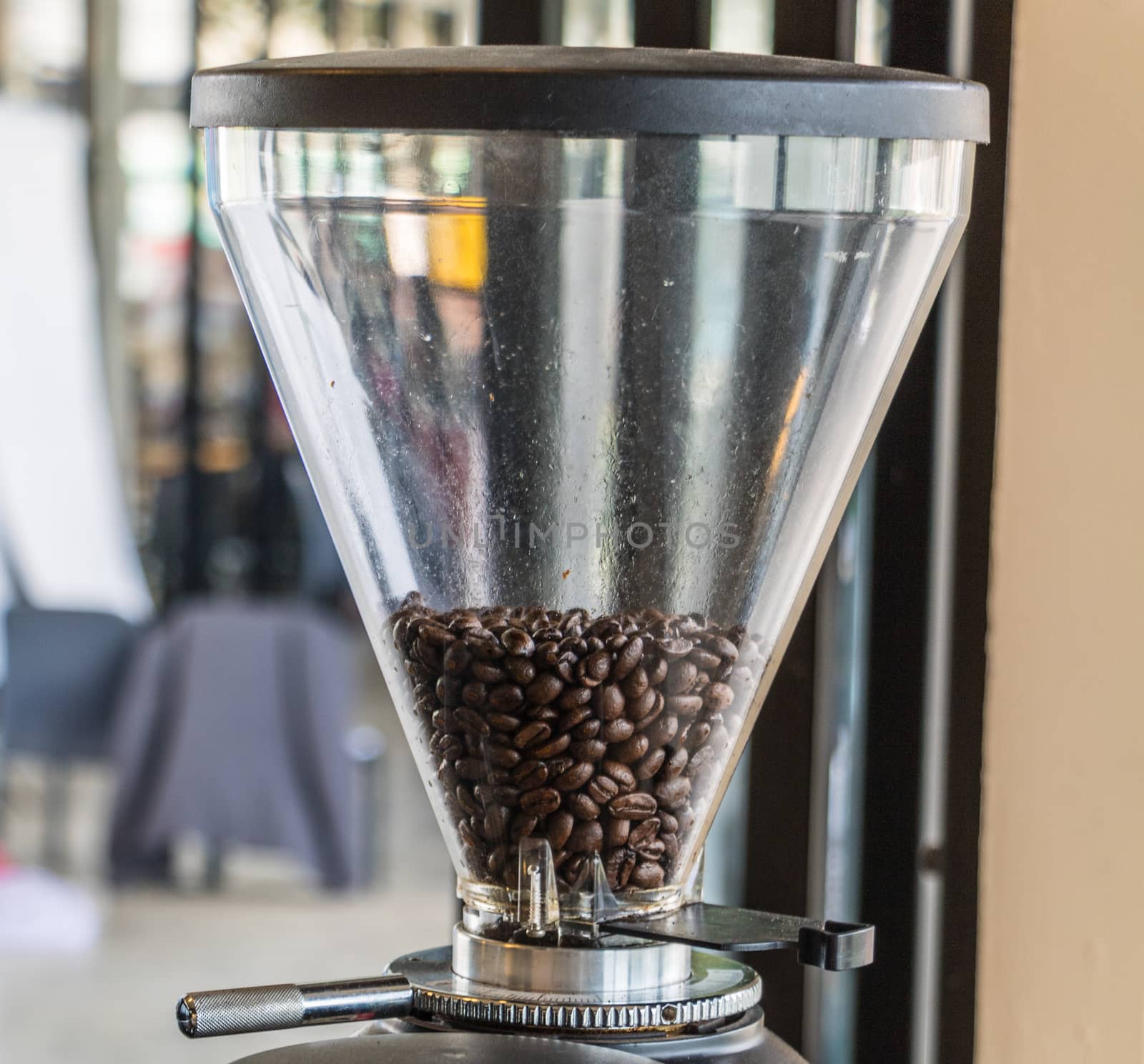Coffee beans in coffee machine.