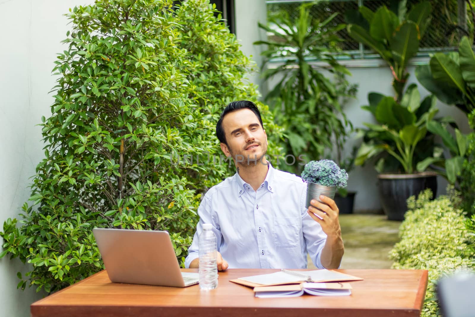 Young man working in the garden.