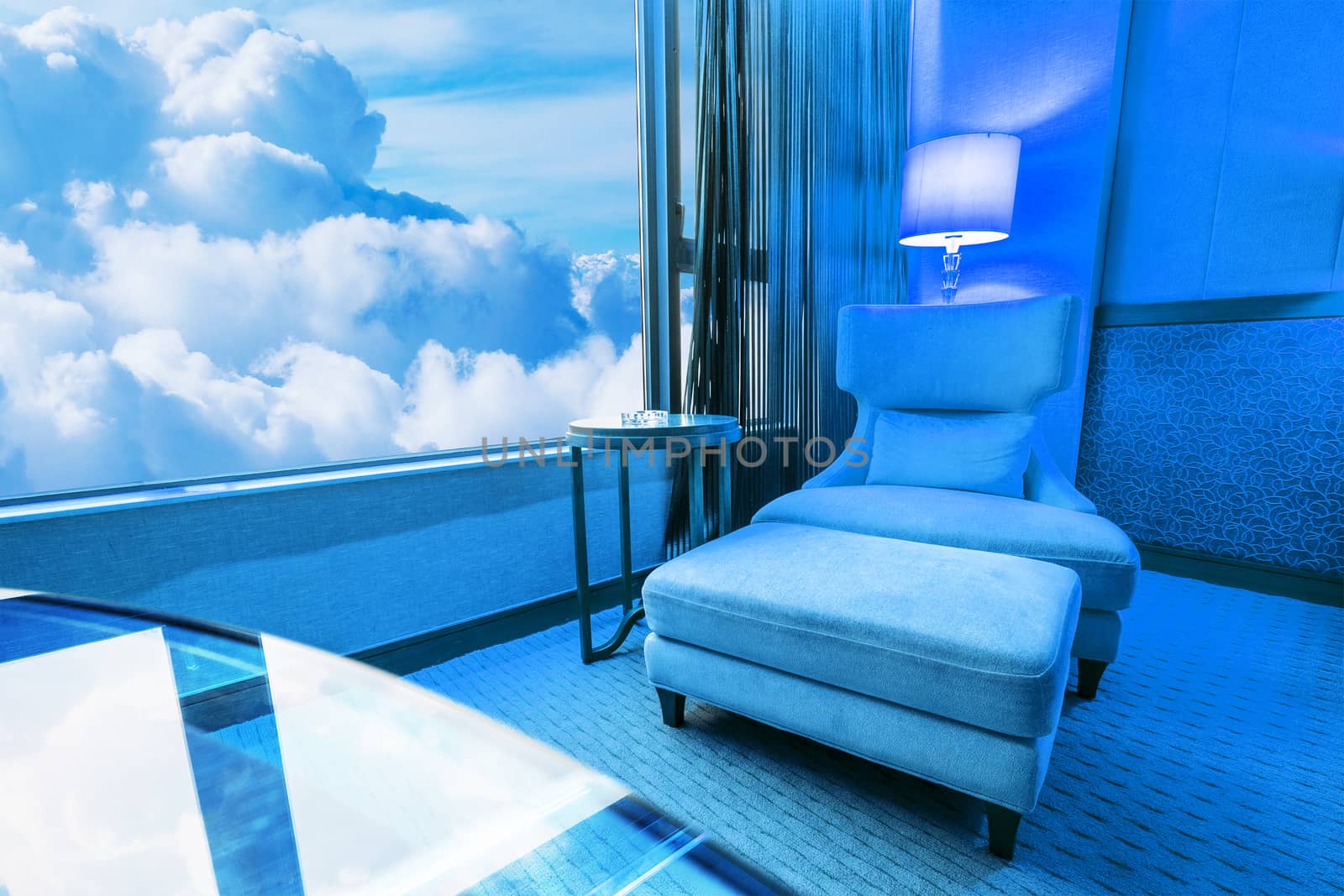 Blue room Sofa in living room and blue sky by Surasak