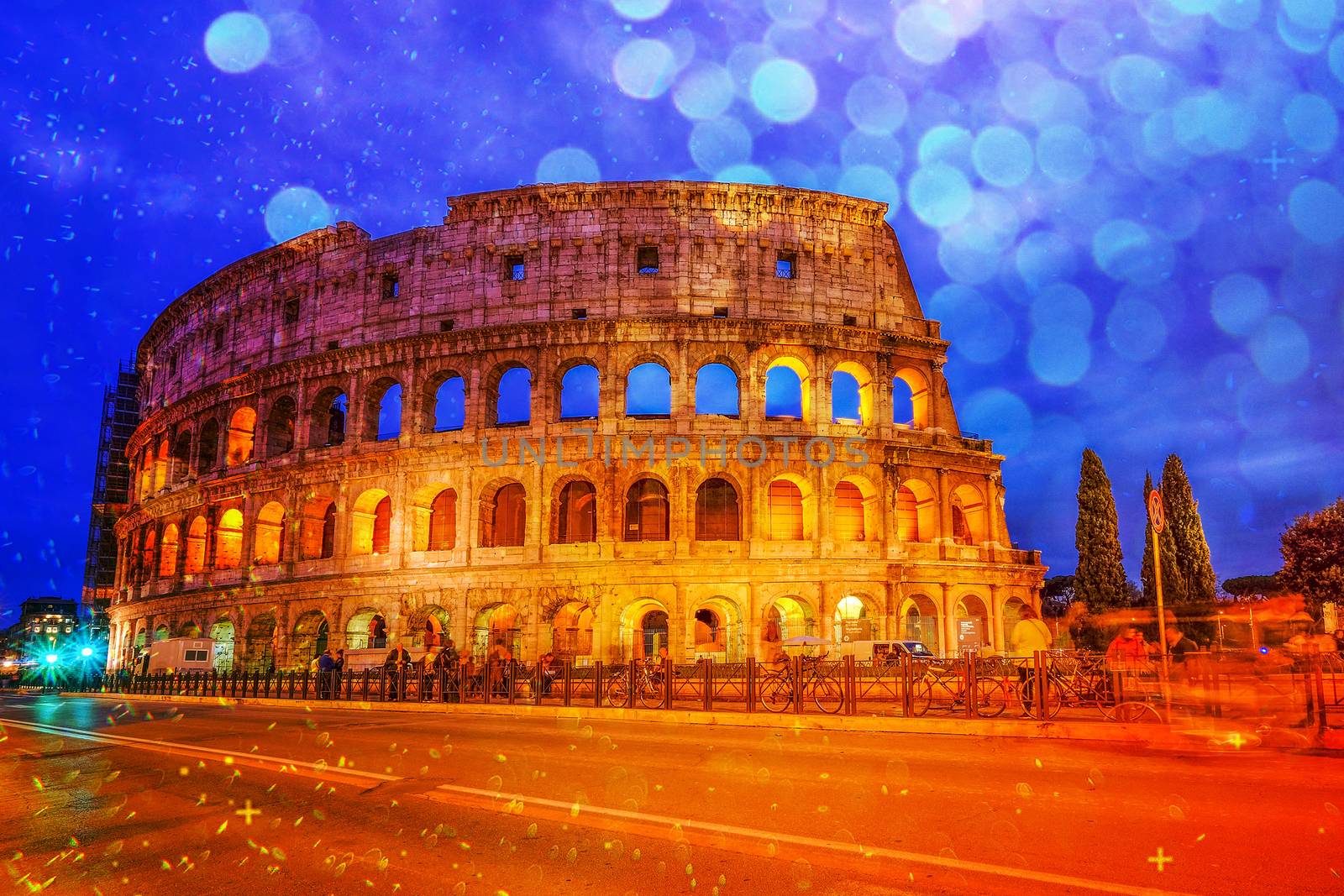 Colosseum, Rome, Italy. Twilight view of Colosseo in Rome with boken effect