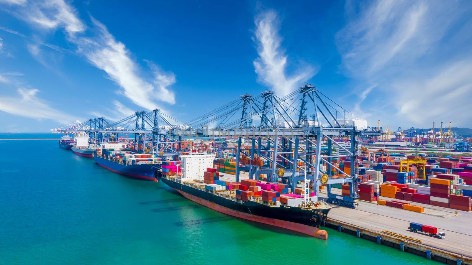 Global transport cargo and logistic business import and export, Container ship in seaport terminal, Container cargo vessel freight shipping company commercial worldwide, Freight transportation ship.