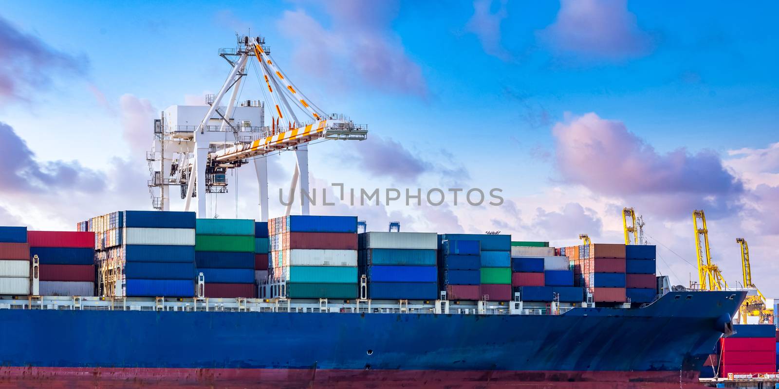 Harbor cargo cranes shipping port equipment, Industrial port crane, Logistics business huge cranes and containers, Cargo freight ship with industrial crane, Container ship in import export business.
