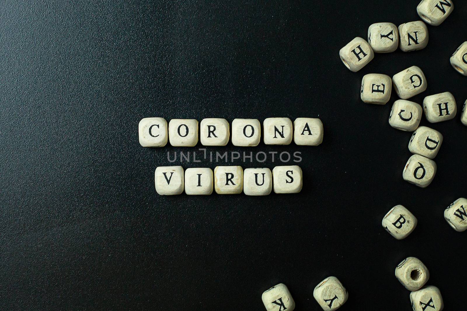 The corona virus  wooden cube  on black background for medical content.