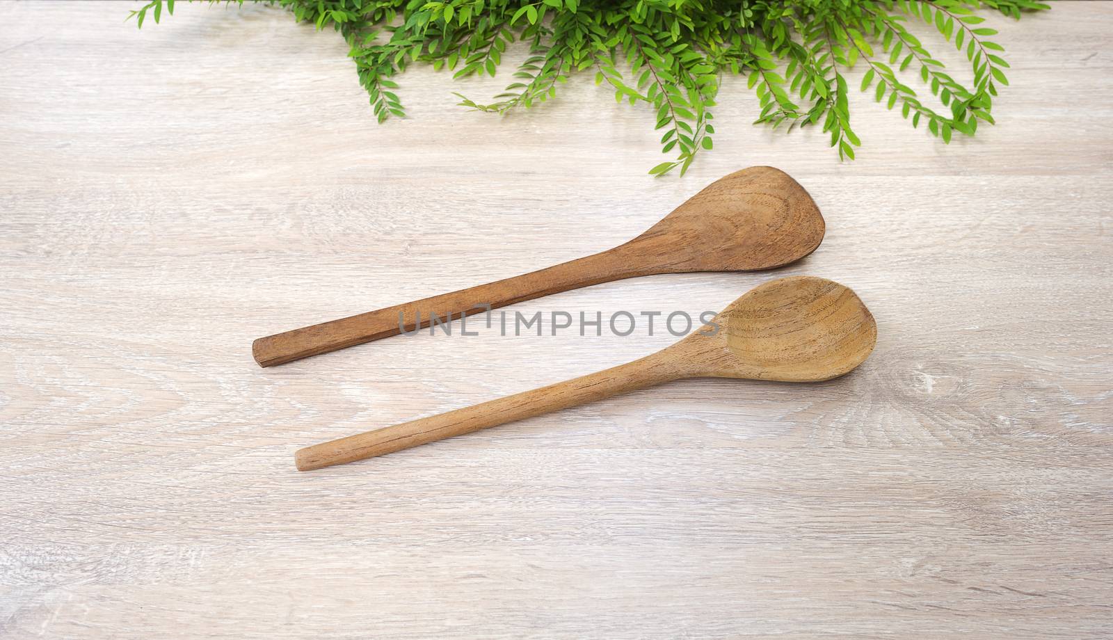 wood spoon wood Turner on white wood background