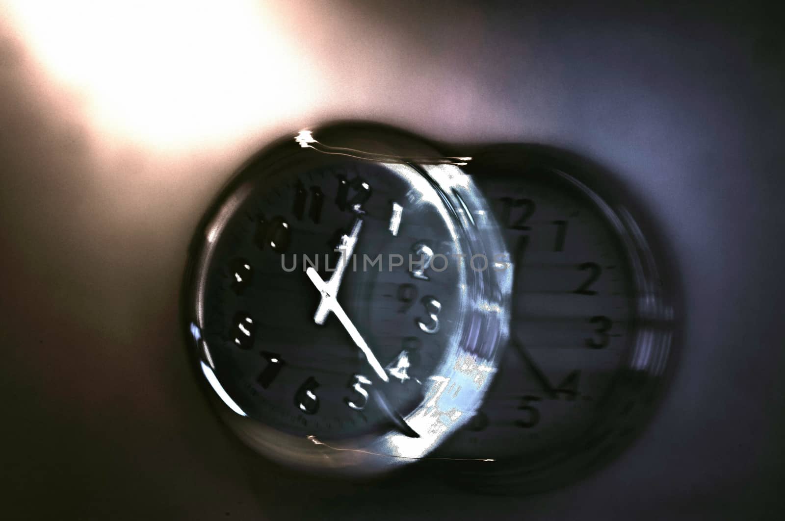 A clock with an effect of movement giving the idea of a new dimension of time