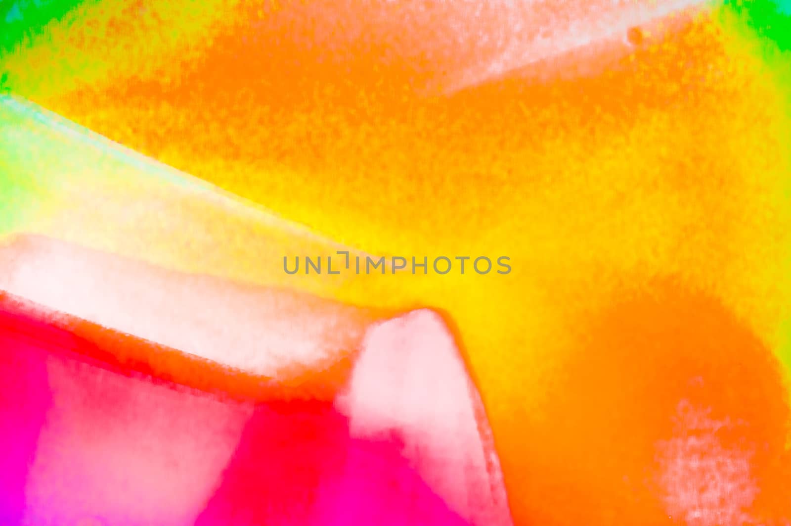 A red, orange and green photographic abstract background
